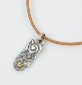 SOLD Oblong Pendant and Rawhide Necklace by Javier Ribeyrol