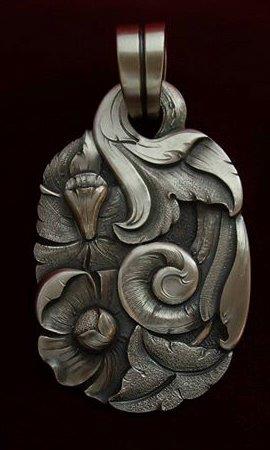 Javier Ribeyrol, Sterling Silver Pendant, braided rawhide necklace by Pablo Lozano, $875