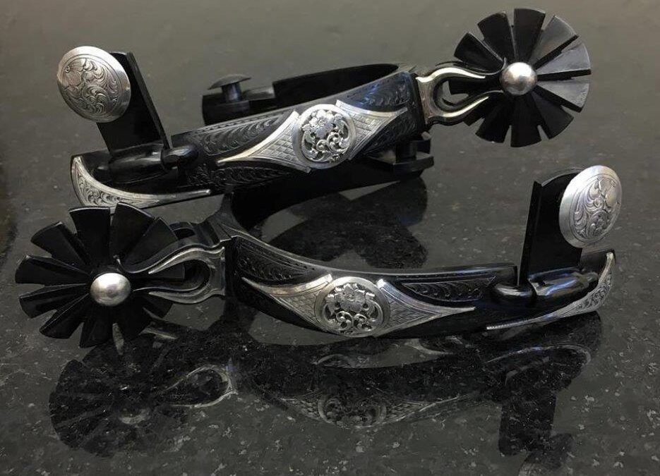 Wilson Capron, Windmill Rowel Spurs, .75 inch band with Chihuahua style shank, sterling silver overlay, scroll filigree focal point in the center of the band, $4,250