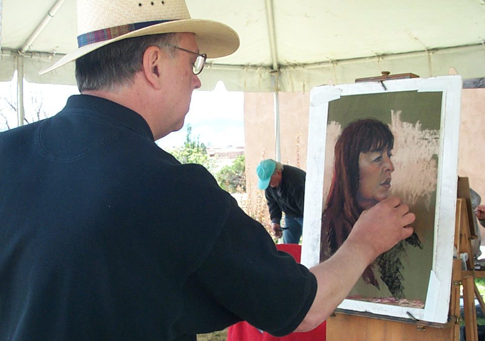 Mike Mahon painting a portrait
