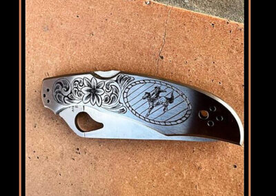 Saddle Bronc Engraved Folding Knife by John Nord – SOLD